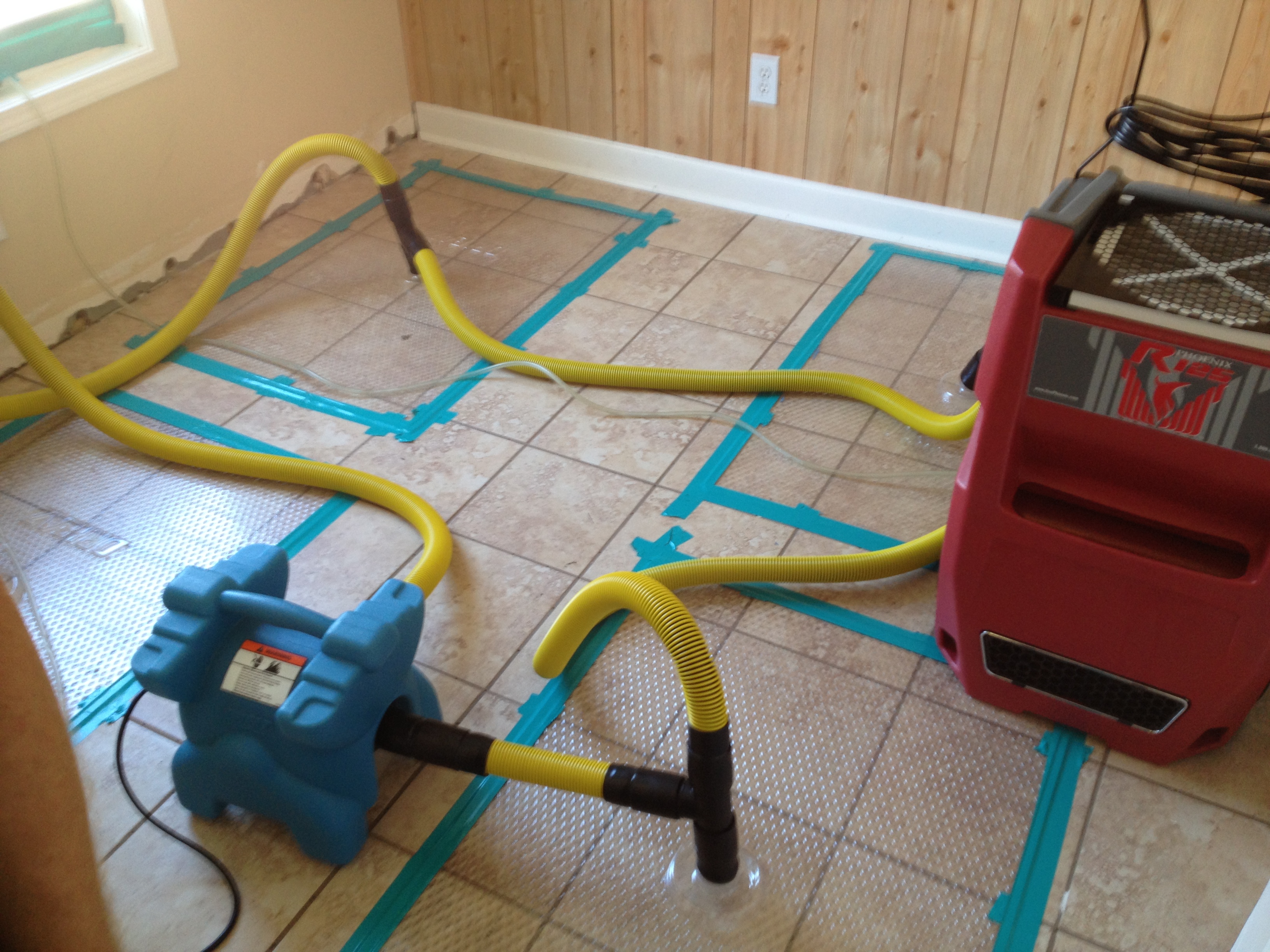 Water Damaged Tile Floor in Delray Beach, Florida